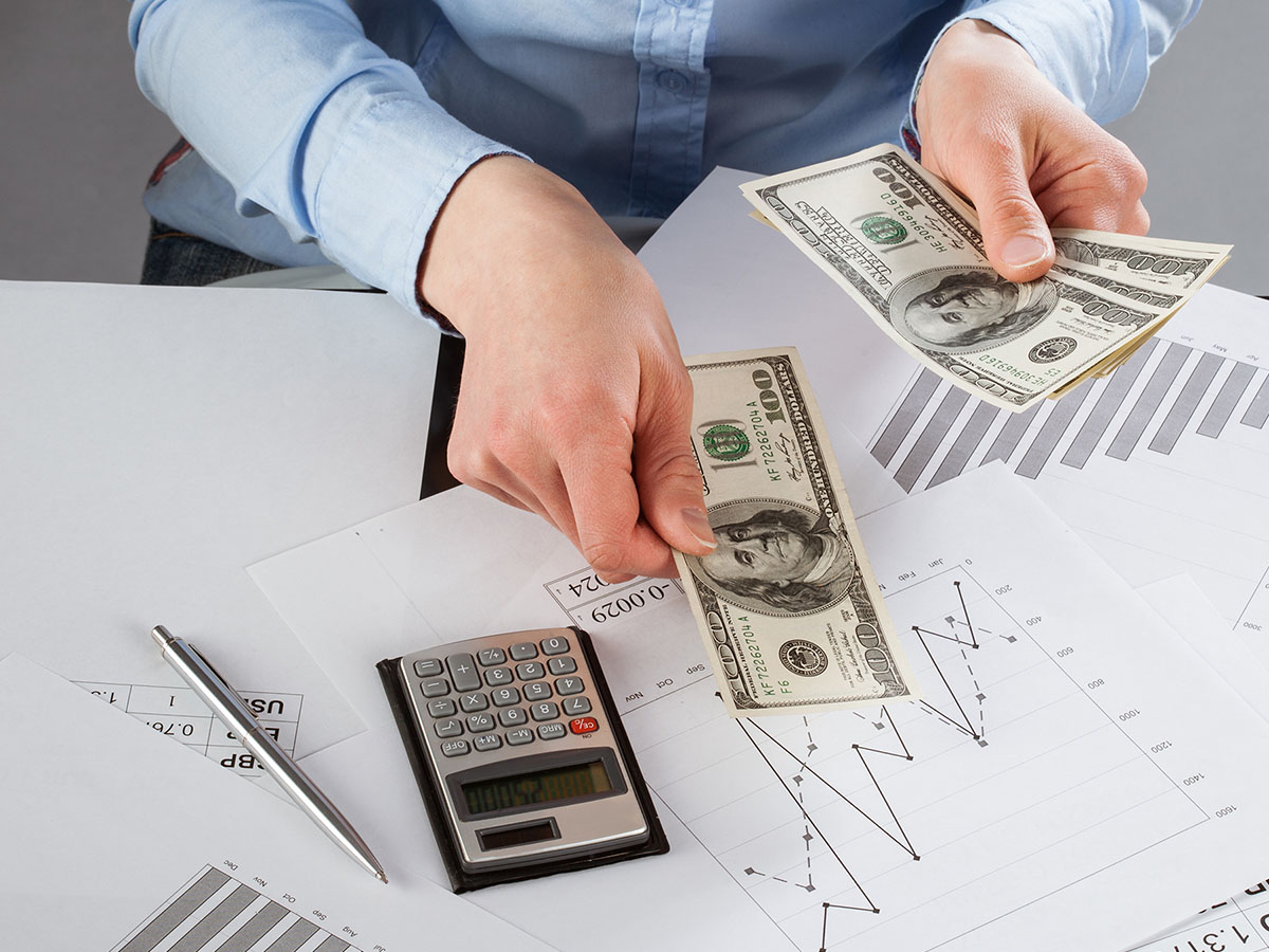 Person counting money